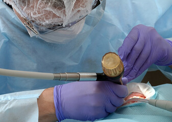 Canvas Print - Dentist doctor working with patient