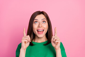 Sticker - Closeup photo of young gorgeous lady directing fingers looking up good news nice smile isolated on pink color background