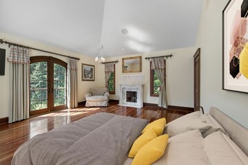 Poster - Interior shot of a beautiful luxury mansion bedroom with a fireplace