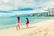 Girls enjoying themselves in Waikiki Beach, Hawaii