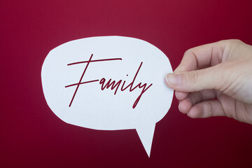 Poster - Speech bubble in front of colored background with Family text.