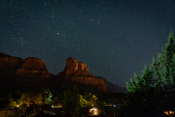 sedona red rocks under a starry night sky
