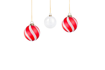 Wall Mural - three christmas ornaments hanging on a transparent background