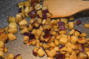 Aubergines Cooking In A Pan