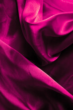 Beautiful Pink Silk Background. Draped Background Of Fabric, Texture