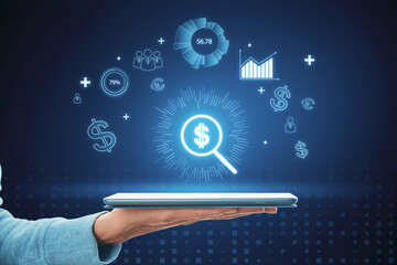 Poster - Abstract image of hand holding cellphone with digital money icons and magnifier. Finding investment funds for business projects.