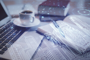Poster - Double exposure of buildings drawing and desktop with coffee and items on table background. Concept of smart city