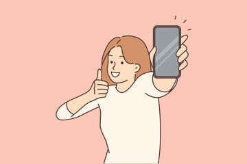 Smiling woman show mockup cellphone screen 