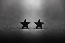 Twin, Duo, Partner, Or Couple. Two Stars Receiving Light From Above. Standing Stars.  Shallow Depth Of Field.