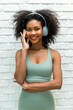 © kanpisut - Portrait of African American woman with bushy curly hairstyle