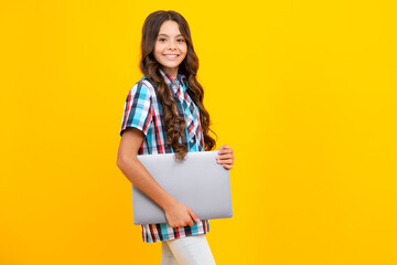 Student school girl with laptop on isolated studio background. Video online webinar, learn on laptop, elearning lesson, pc computer call.
