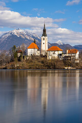 Canvas Print - Bled lake with Bled catle, church and winter Julian Alps at background