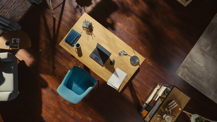 Poster - Top View Shot of Home Office: Stylish Empty Home Office Space, Wooden Desk, Laptop Computer, Wooden Floores, Very Tastefully Done. Contemporary Cozy Apartment with No Peope.