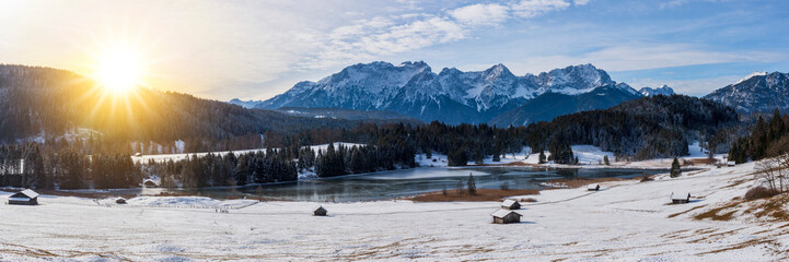 Wall Mural - panoramic winter landscape with mountain range and snow