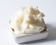 Small plate of lard on white background