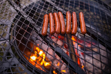 High Angle View Of Sausages On Barbecue Grill