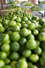 Limes Are For Sale At An Open Air Market In Guatemala.