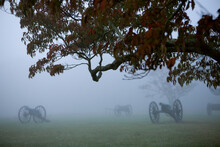 Civil War Era Battle Field At Dusk, In The Fog.