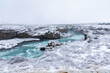 River coming from Godafoss in the snow
