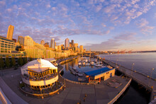 Seattle Harbor At Sunset With The Seattle Skyline In The Background, Seattle, Washington, USA.