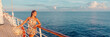 © Maridav - Cruise woman relaxing on deck watching sunset from ship on Caribbean luxury travel vacation. Panoramic banner of sea and boat. Multiracial model.
