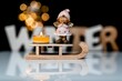 Closeup of a little angel on a sled with a candle and the word winter in the background