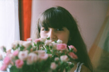 A Girl With A Flower Bouquet 