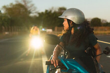 Young Girl On A Motorbike.