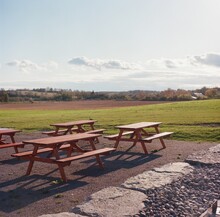 Empty Picnic Tables At A Rural Vineyard In Ontario Canada