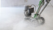 © Vladyslav - Concrete grinder, industrial equipment at work, concrete floor repair in industrial premises
