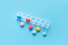 Medicine Pill Box With Multicolored Soft Balls.