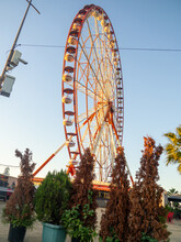 Part Of The Ferris Wheel. Ferris Wheel At An Unusual Angle. Entertainment Industry.