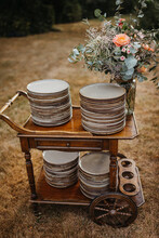 Rustic Wooden Trolley Table With Plates