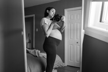 Black And White Selfie Of Pregnant Woman In Third Trimester