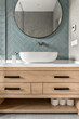 © Andriy Bezuglov/Stocksy - Contemporary interior of bathroom inside country house