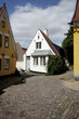 © Marcel/Stocksy - Cute house in Danish village