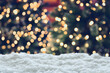Leinwandbild Motiv Empty white snow with blur Christmas tree with bokeh light background
