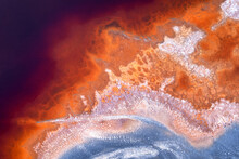 Top View Of Abstract Rivers With Vibrant Orange And Blue Colors 