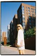 © Alexander Kalinin/Stocksy - Businesswoman in city