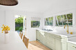 © Trinette Reed/Stocksy - Modern kitchen in small cottage