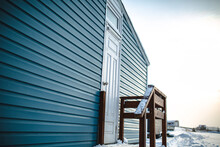 White Door And Blue Wall. 
Beauty Winter Tiny House.
