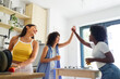© Studio Firma/Stocksy - Three Women Having Fun in Kitchen