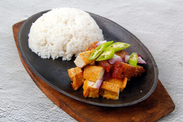 Wall Mural - Freshly cooked Filipino food called Tokwa't Baboy with rice