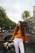 Portrait Of A Smiling Young Woman In Amsterdam