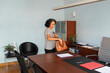 © Lightsy/Stocksy - Businesswoman arriving at the office