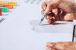 © AUDSHULE/Stocksy - Hand pulling lines with brush