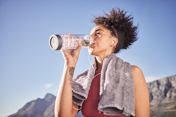 Canvas Print - Music, drinking water and woman in nature for fitness, training and morning cardio run along mountain with mockup. Podcast, water and black woman relax after running with radio, wellness and track