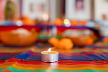 Lit Candle In Mexican Offering Altar