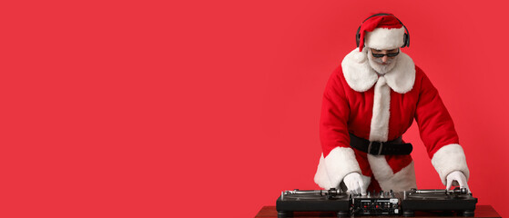 Canvas Print - Cool Santa DJ playing music on red background with space for text