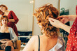 © Ivona Zivulj/Stocksy - Close-up of Hairdresser's Hands Styling Client's Hair